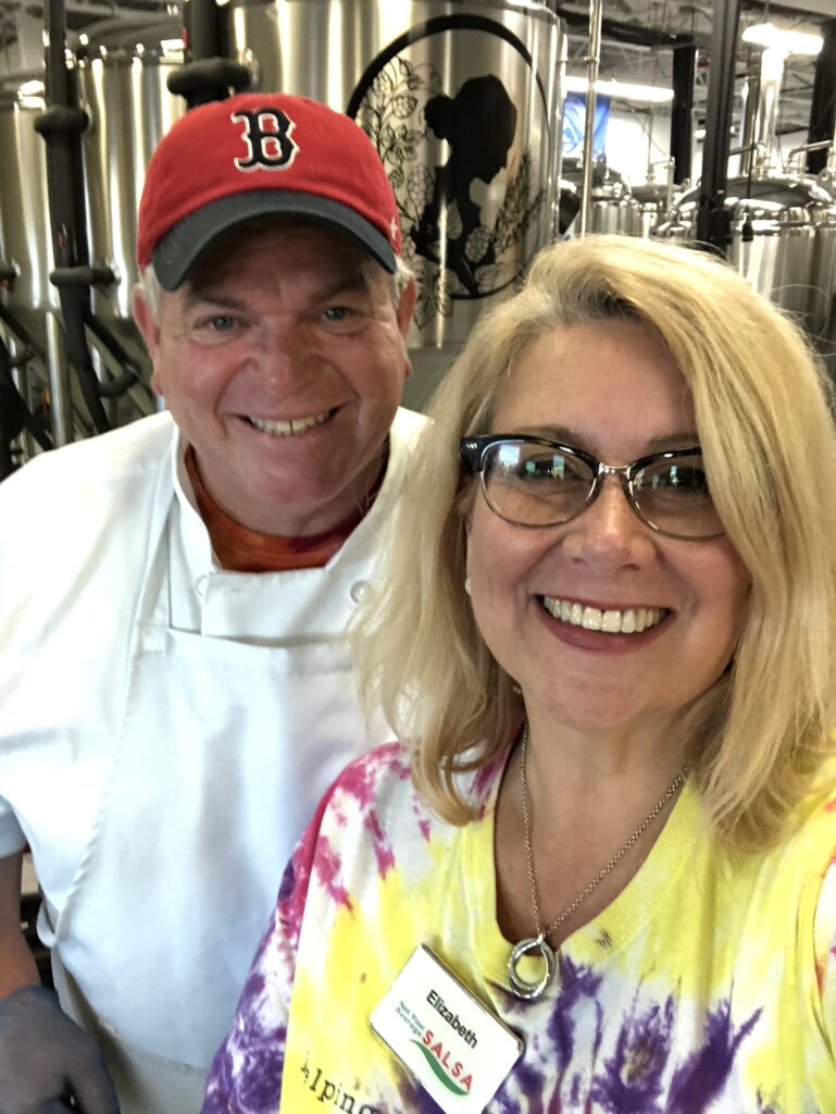 Elizabeth and Stephen serving salsa at Widowmaker Brewery